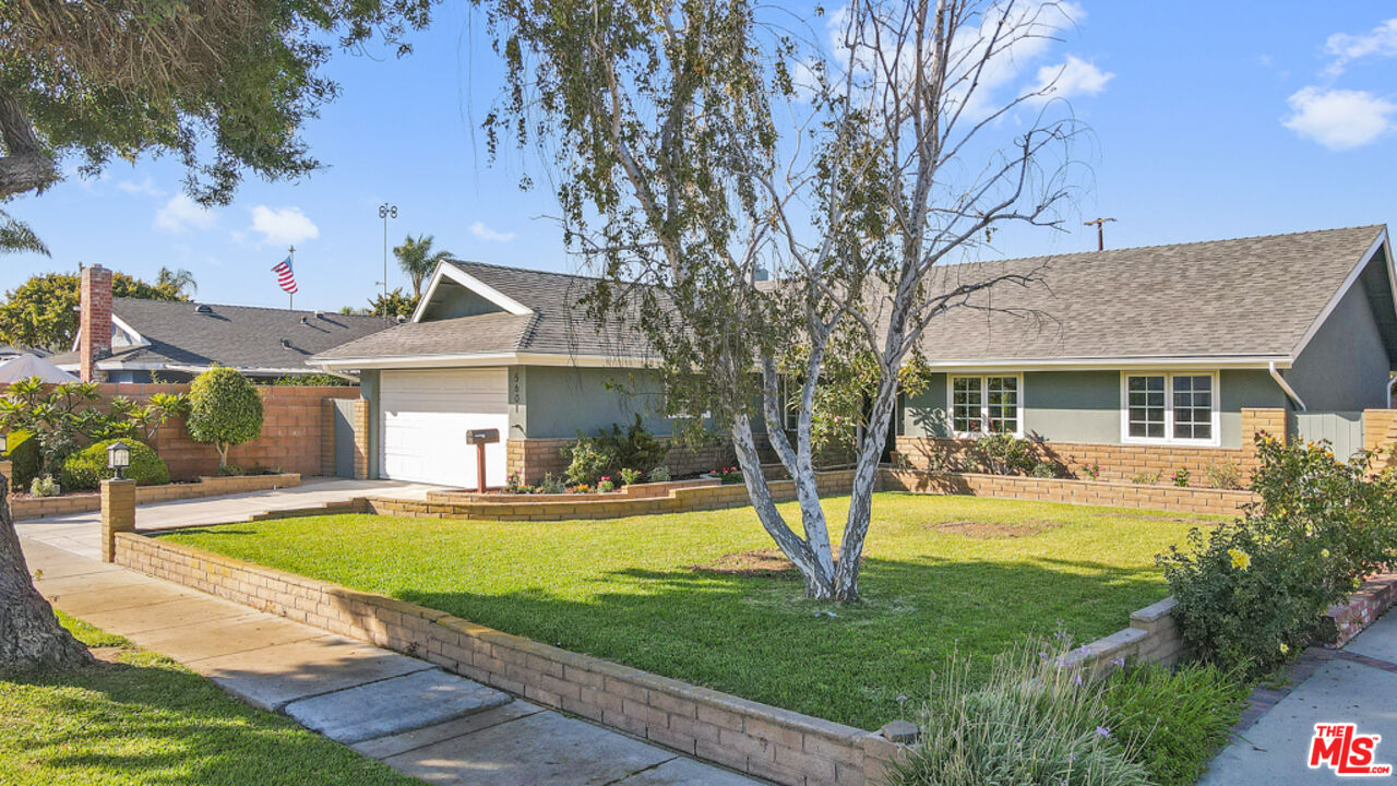 5601 Middlecoff Drive Huntington Beach, CA 92649 - Photo 2 of 49 a view of a house with a yard patio and swimming pool