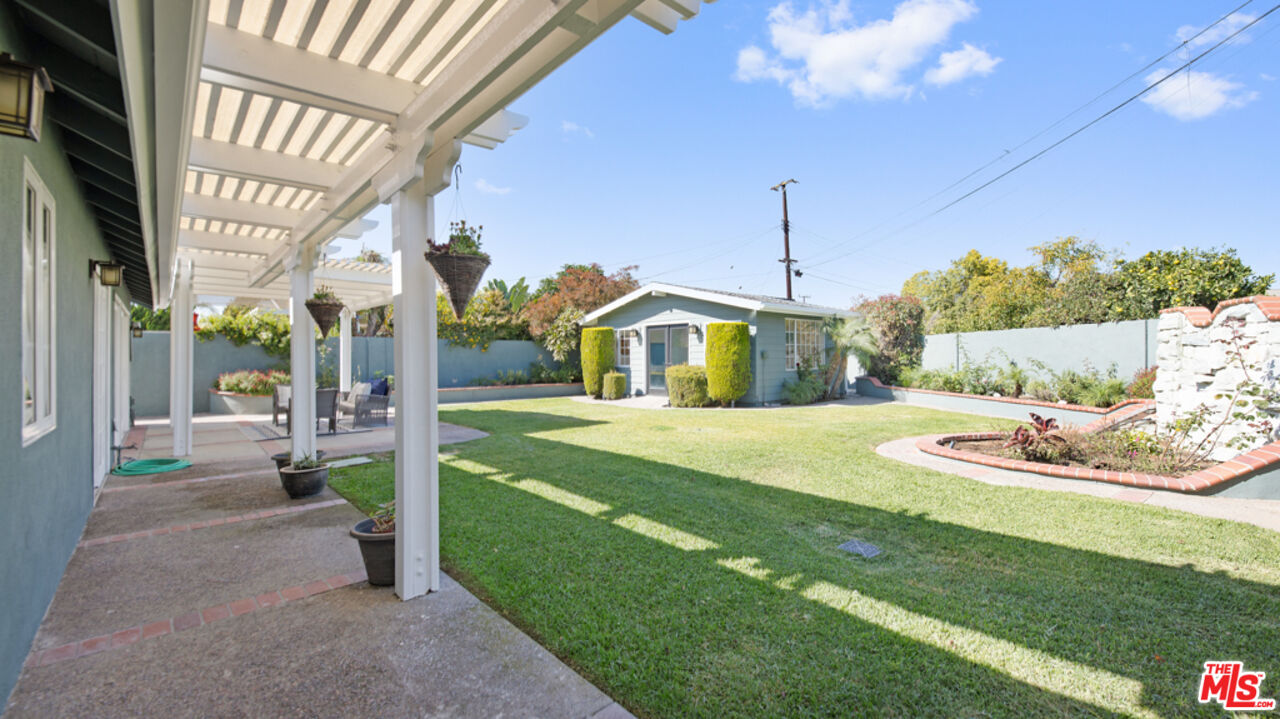 5601 Middlecoff Drive Huntington Beach, CA 92649 - Photo 37 of 49 a front view of a house with a yard