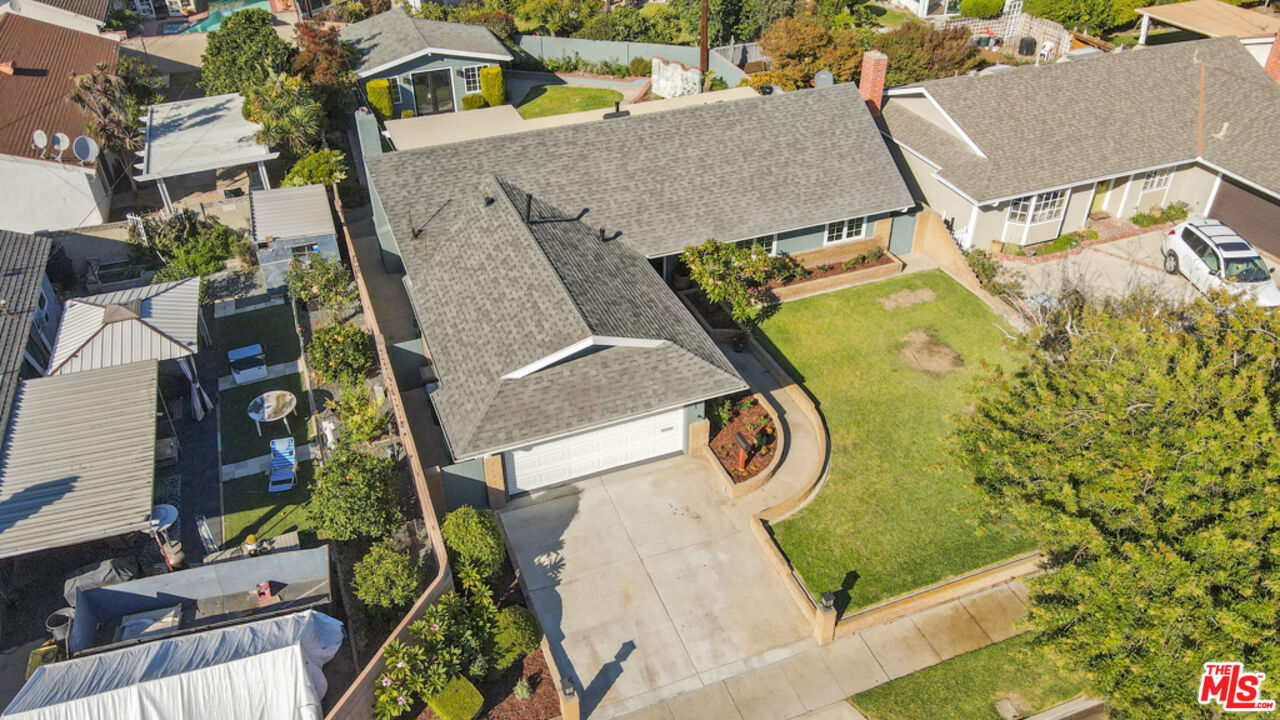 5601 Middlecoff Drive Huntington Beach, CA 92649 - Photo 4 of 49 an aerial view of a residential houses with yard