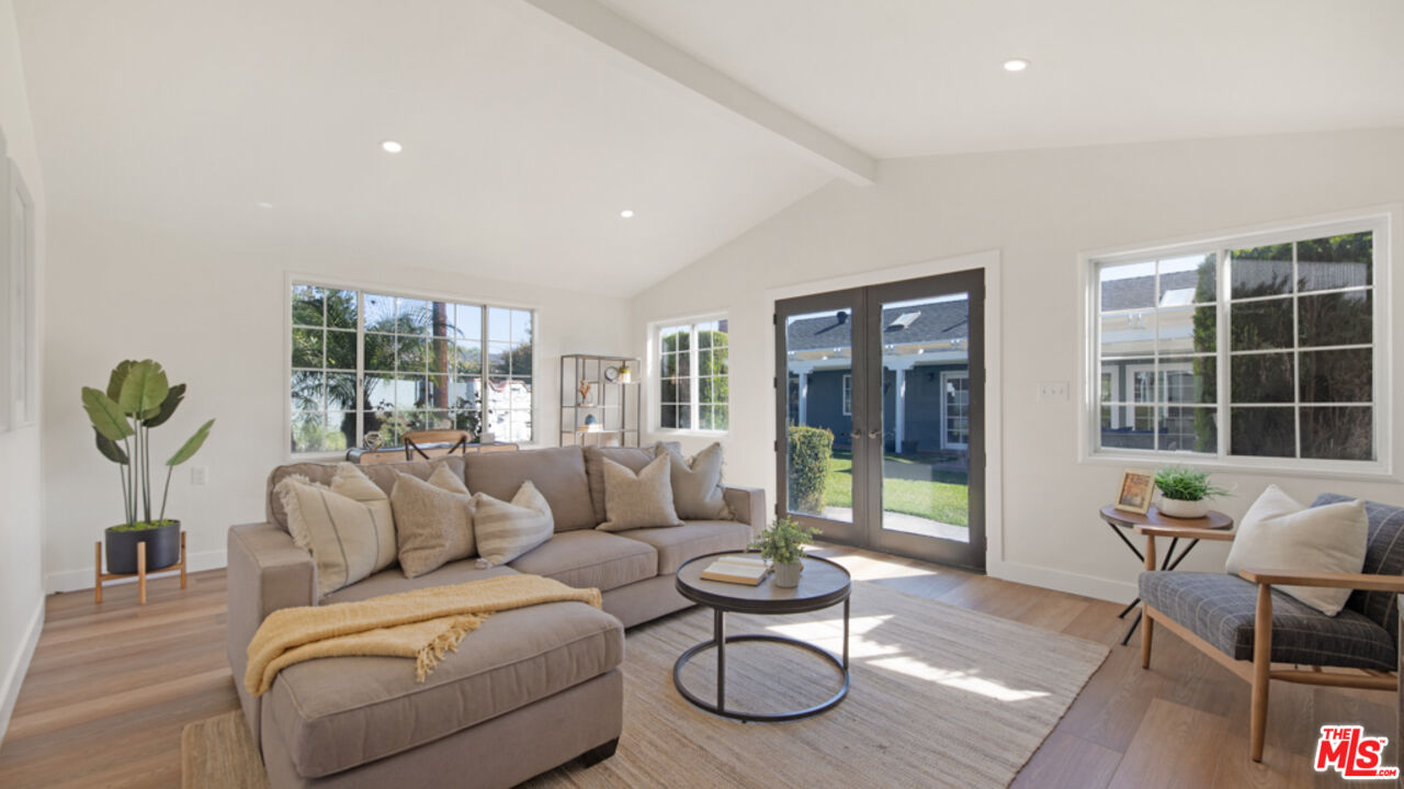 5601 Middlecoff Drive Huntington Beach, CA 92649 - Photo 43 of 49 a living room with furniture and a large window