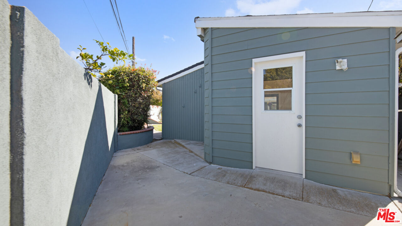 5601 Middlecoff Drive Huntington Beach, CA 92649 - Photo 47 of 49 a view of a house with a flower plants