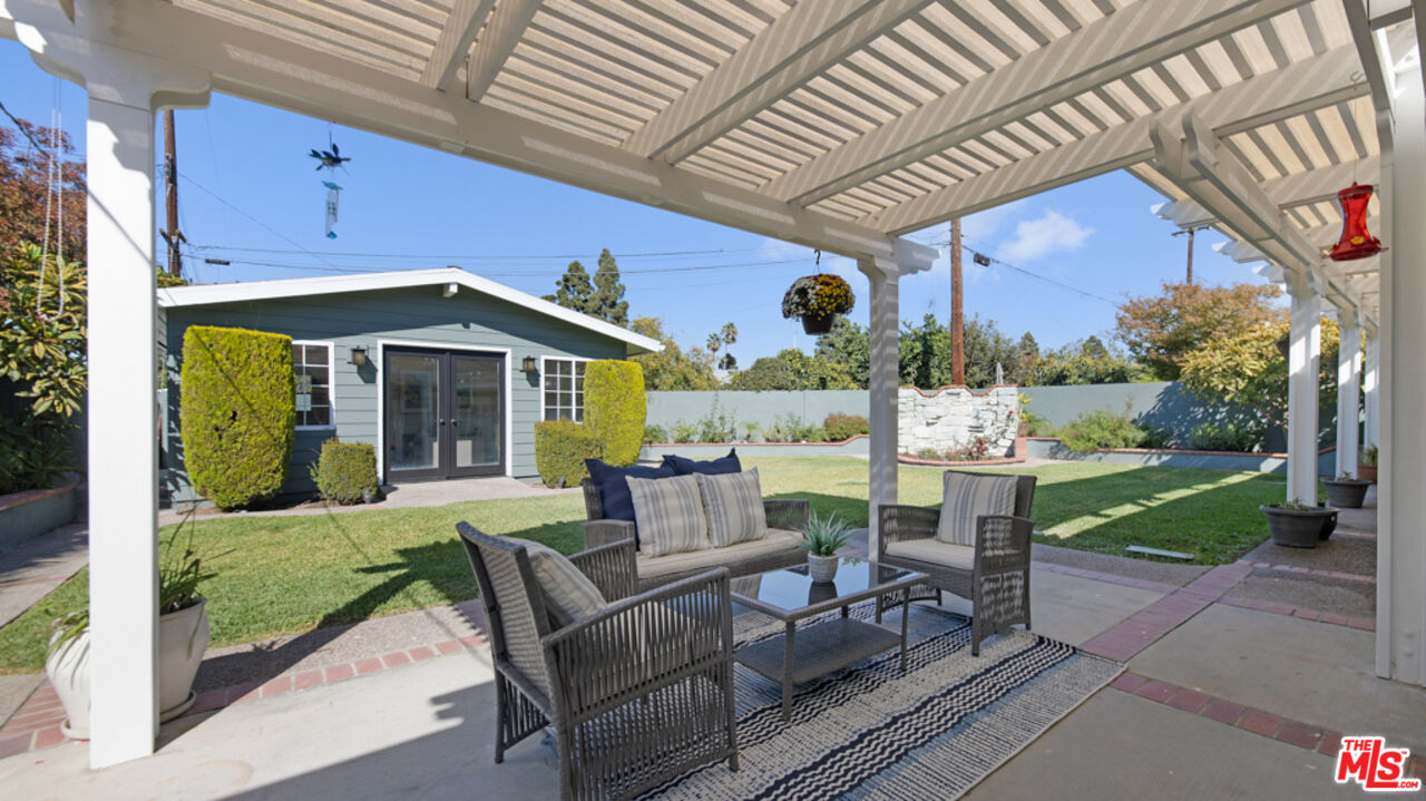 5601 Middlecoff Drive Huntington Beach, CA 92649 - Photo 48 of 49 a view of a house with backyard and sitting area