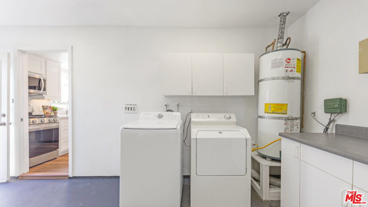 5601 Middlecoff Drive Huntington Beach, CA 92649 - Photo 49 of 49 a utility room with dryer and washer
