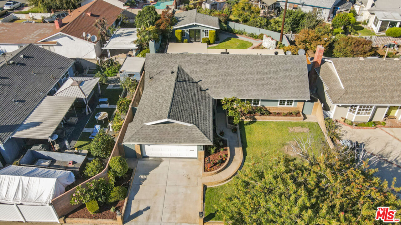 5601 Middlecoff Drive Huntington Beach, CA 92649 - Photo 5 of 49 an aerial view of a house with swimming pool