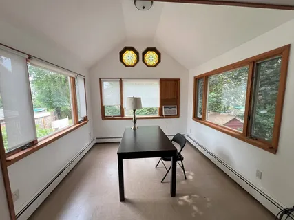 a view of an entryway with sitting area