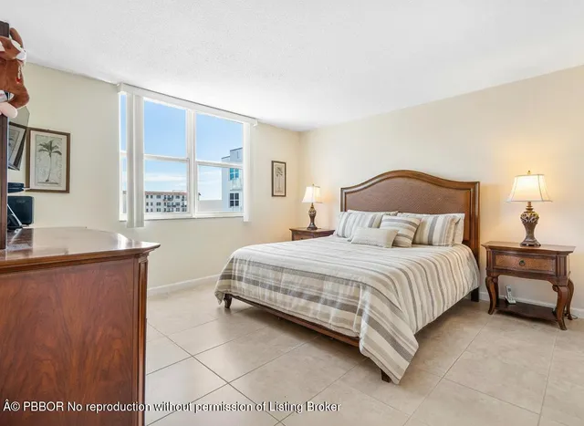 a living room with stainless steel appliances kitchen island granite countertop furniture and a kitchen view