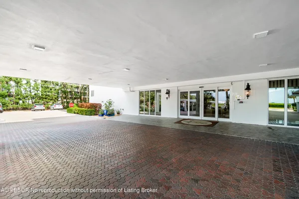 a kitchen with stainless steel appliances granite countertop a stove top oven a sink and a microwave