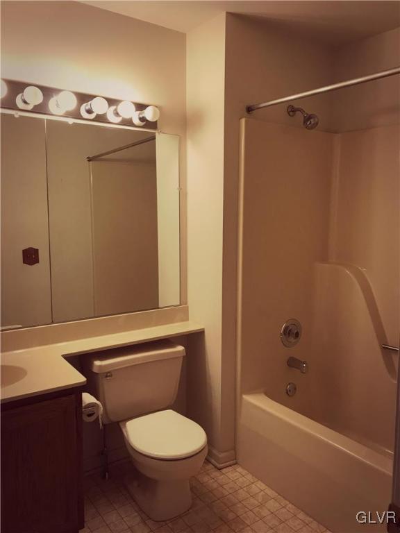 1201 Butztown Road, Unit 14 Bethlehem, PA 18017 - Photo 12 of 13 a bathroom with a shower a toilet and sink