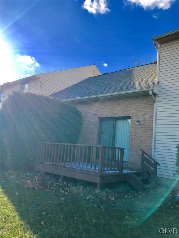 1201 Butztown Road, Unit 14 Bethlehem, PA 18017 - Photo 3 of 13 a view of backyard with wooden fence