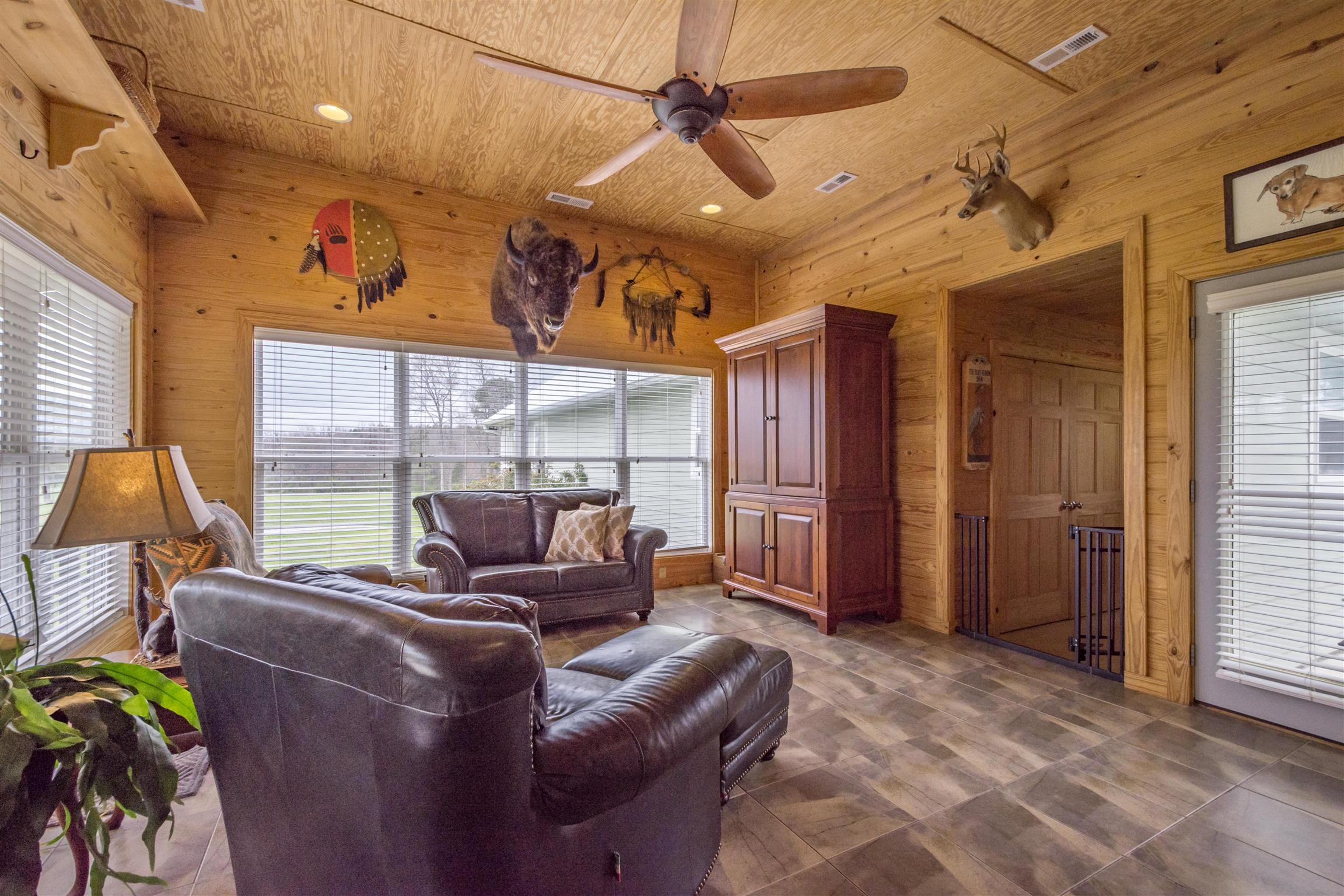 601 Vinta Mill Road West Prospect, TN 38477 - Photo 11 of 30 a living room with furniture a ceiling fan and a window