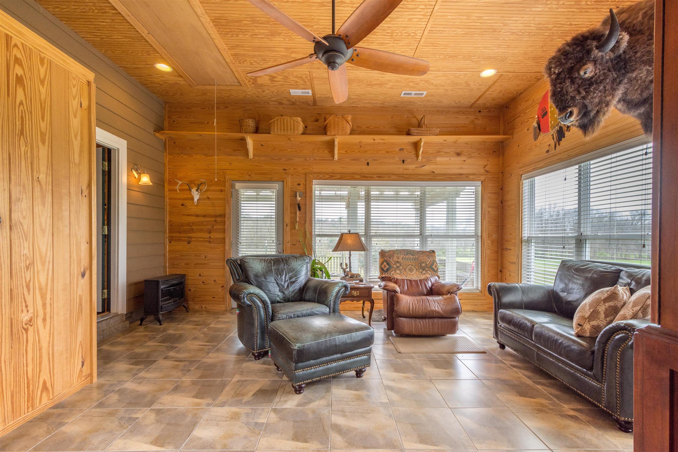 601 Vinta Mill Road West Prospect, TN 38477 - Photo 12 of 30 a living room with furniture and a large window