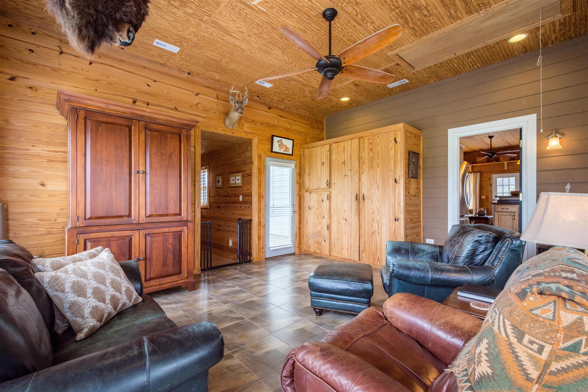 601 Vinta Mill Road West Prospect, TN 38477 - Photo 13 of 30 a living room with furniture and a ceiling fan