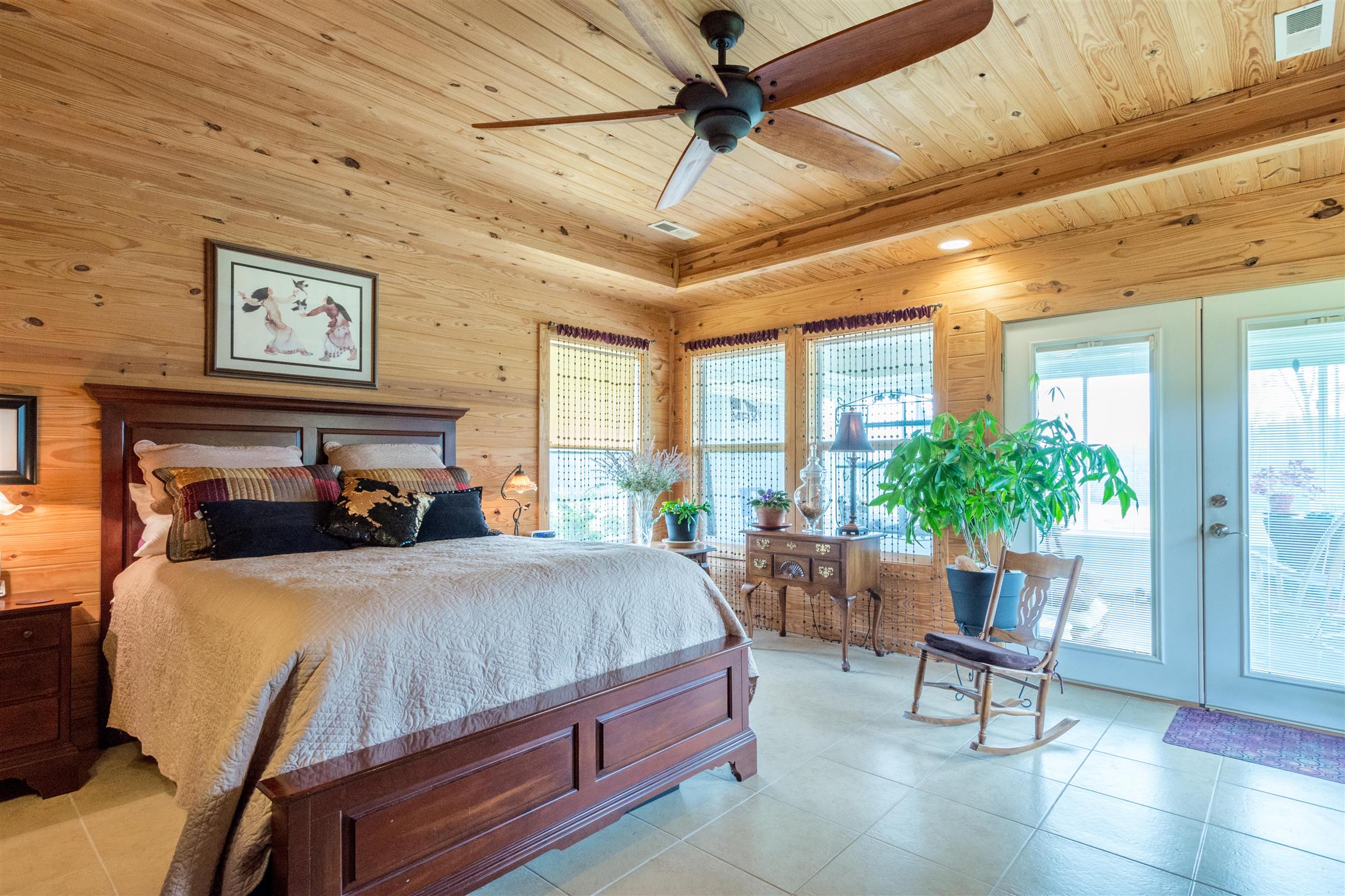 601 Vinta Mill Road West Prospect, TN 38477 - Photo 17 of 30 a bedroom with a bed a window and potted plant