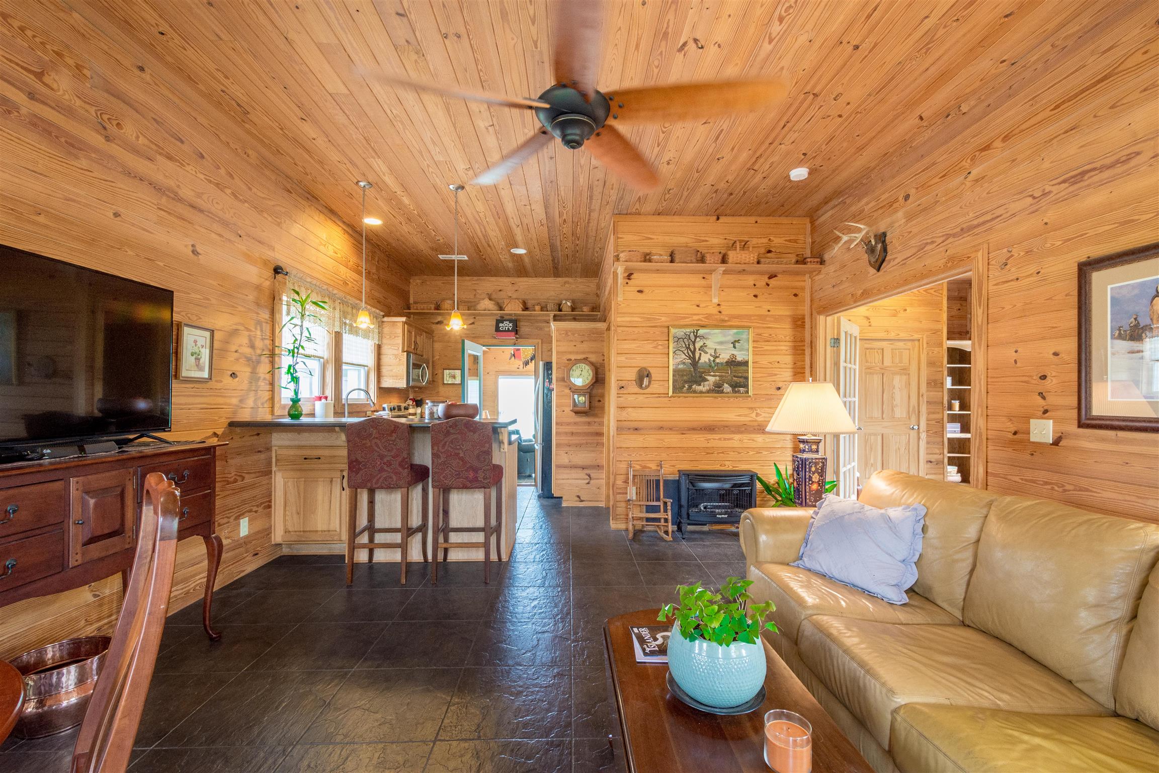 601 Vinta Mill Road West Prospect, TN 38477 - Photo 3 of 30 a living room with furniture and a flat screen tv