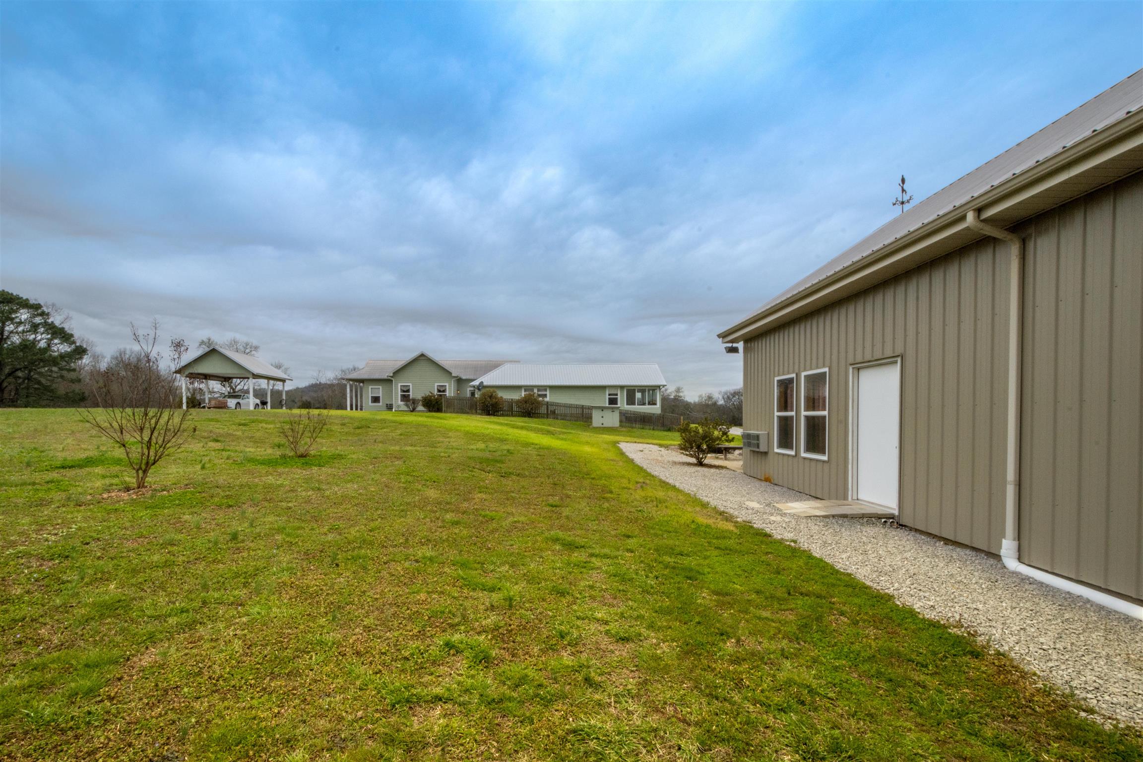 601 Vinta Mill Road West Prospect, TN 38477 - Photo 28 of 30 a view of swimming pool with lawn chairs and large trees