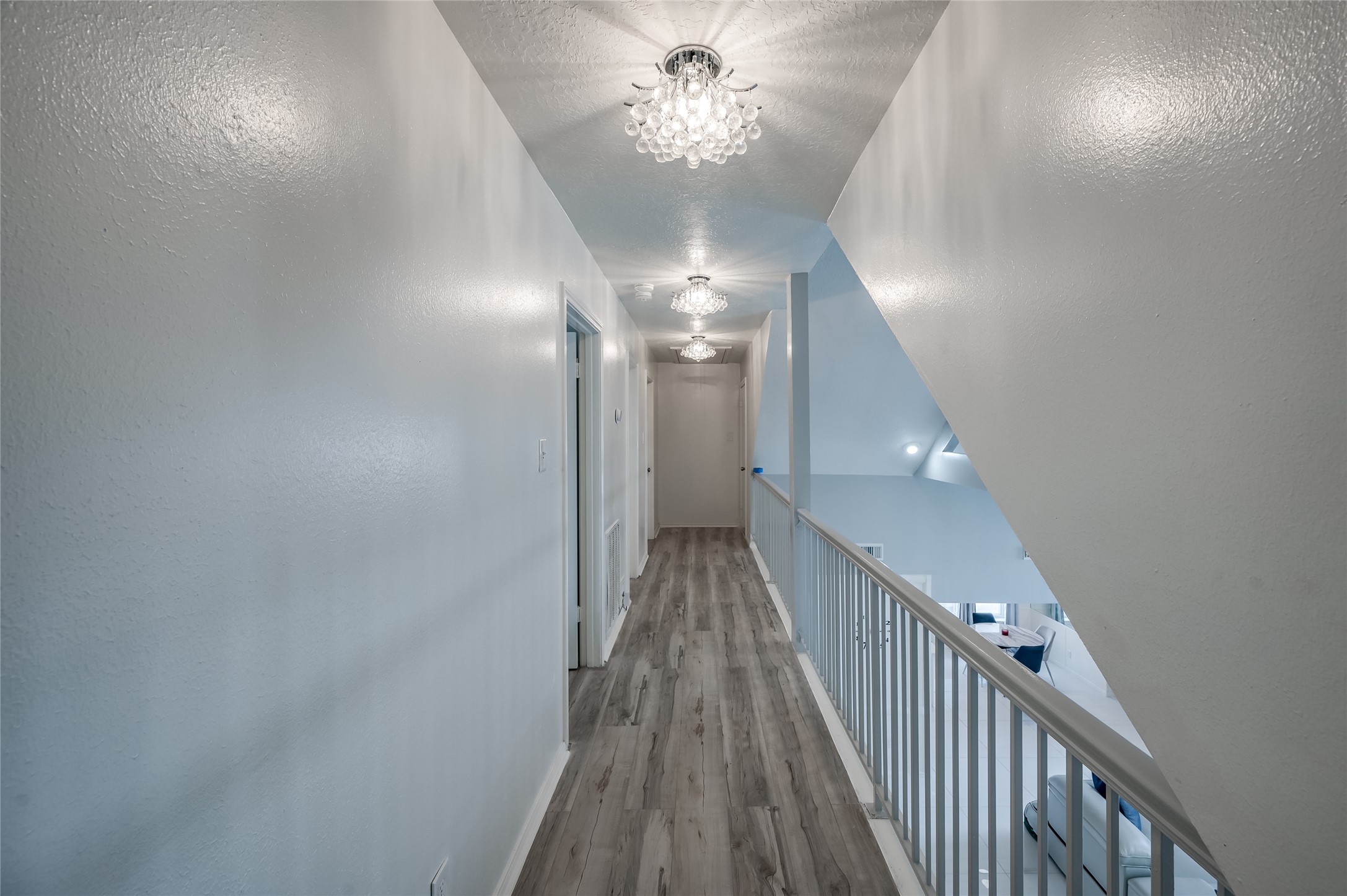 611 Montclair Boulevard Sugar Land, TX 77478 - Photo 37 of 50 The walkway on the 2nd floor going into the rooms.