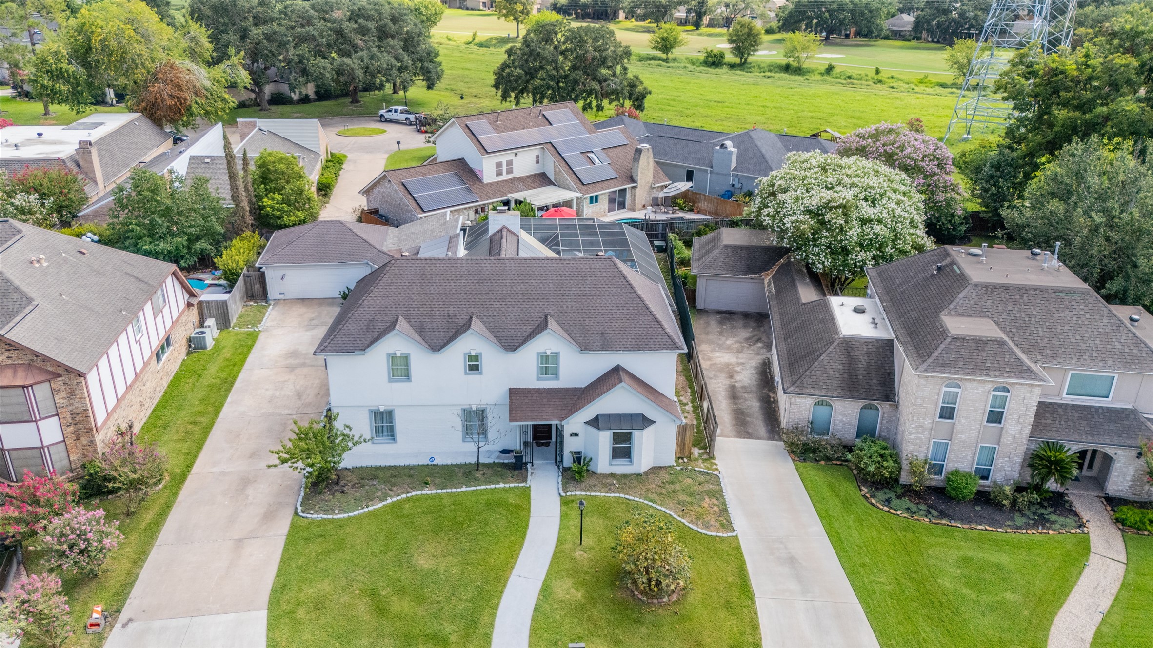 611 Montclair Boulevard Sugar Land, TX 77478 - Photo 49 of 50 Another perspective of its layout and design. This angle highlights the home's flow, outdoor spaces, and how different areas connect, offering a comprehensive look at the overall structure and its relationship with the surrounding environment.