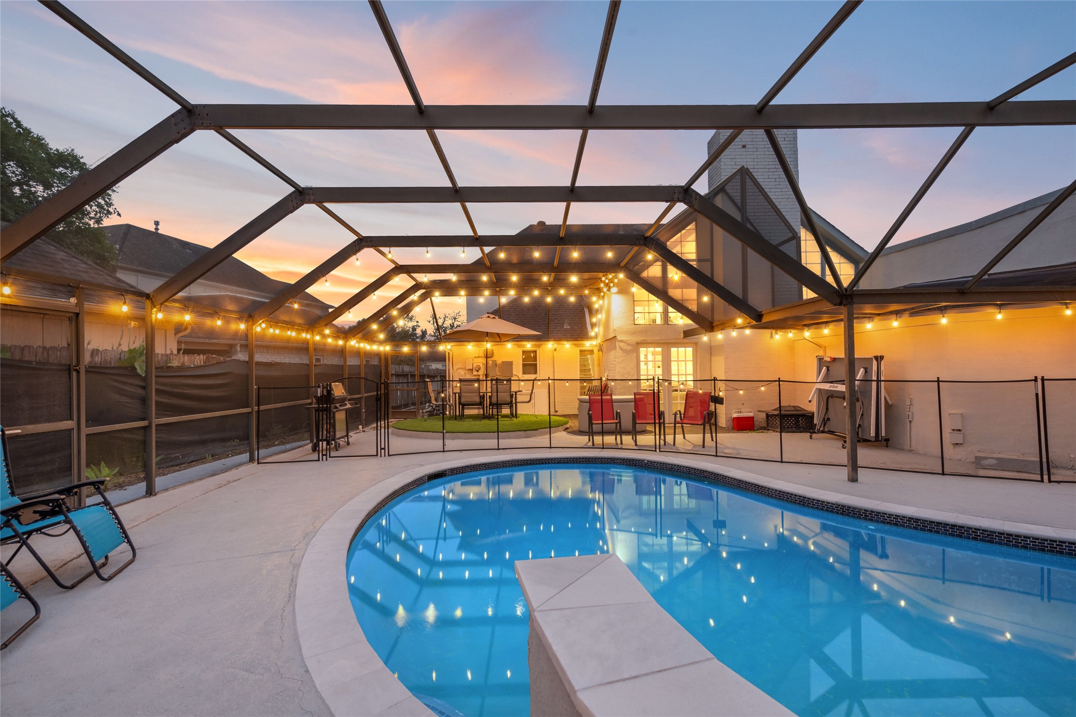 611 Montclair Boulevard Sugar Land, TX 77478 - Photo 6 of 50 This pool area offers a resort-like experience, with loungers and ample space for sunbathing or hosting poolside parties.