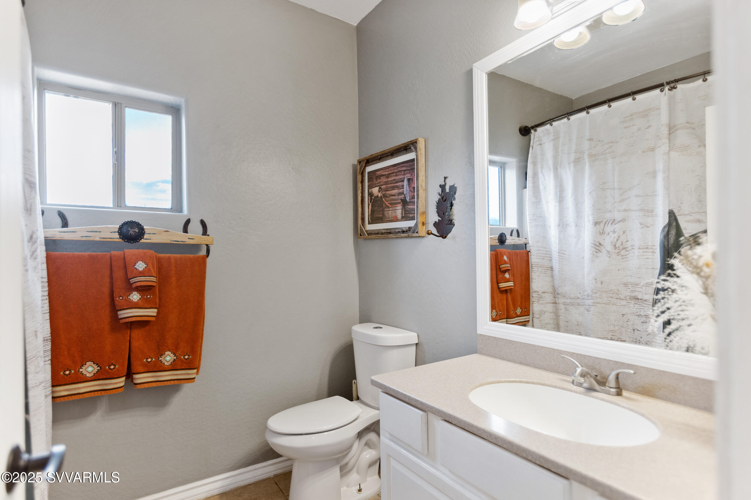455 East Flint Knap Way Camp Verde, AZ 86322 - Photo 24 of 49 a bathroom with a sink toilet and shower