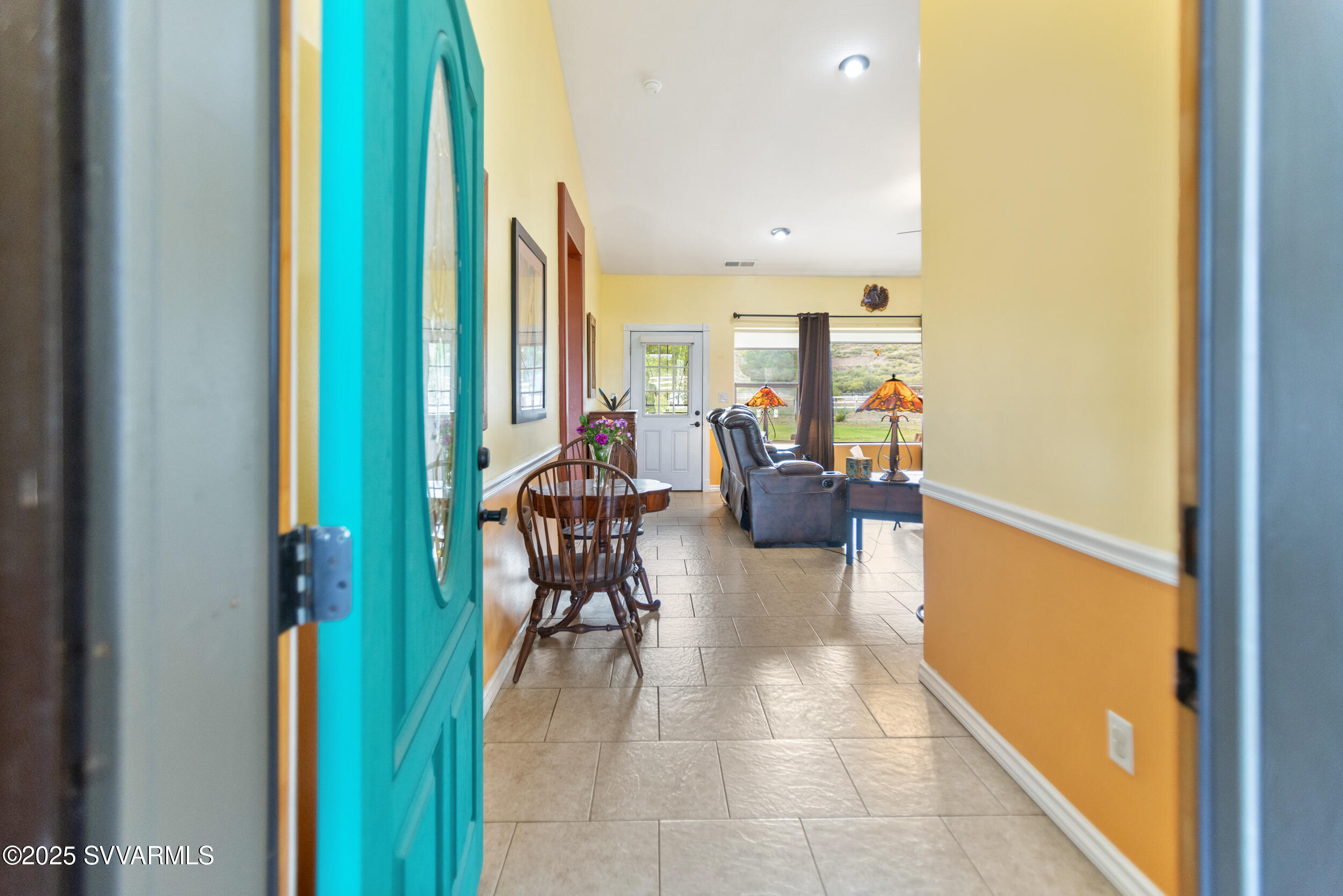 455 East Flint Knap Way Camp Verde, AZ 86322 - Photo 3 of 49 a very nice looking room with a large window