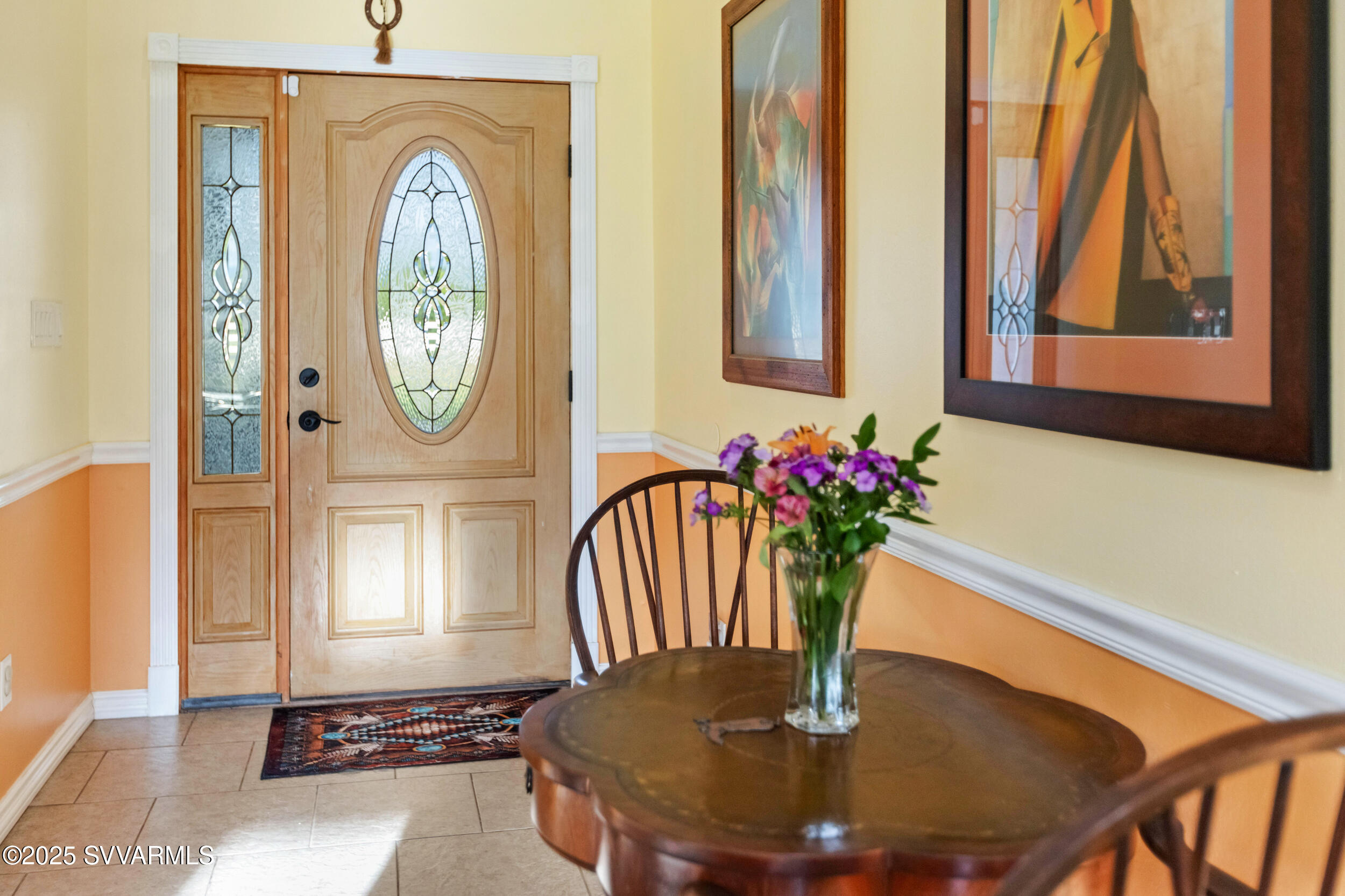 455 East Flint Knap Way Camp Verde, AZ 86322 - Photo 4 of 49 a vase of flowers sitting on a dining table