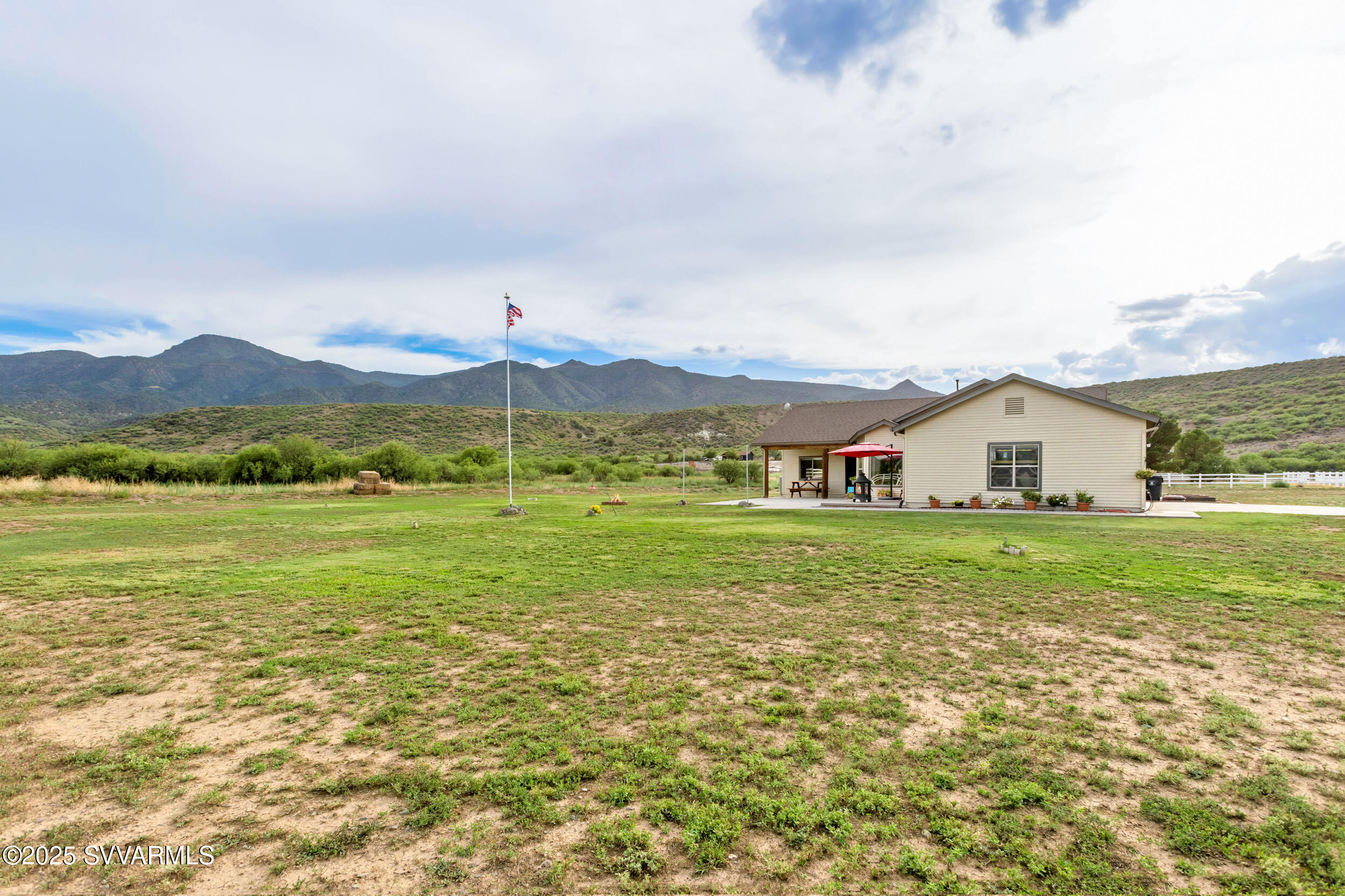 455 East Flint Knap Way Camp Verde, AZ 86322 - Photo 44 of 49 a view of an house with a garden and mountains