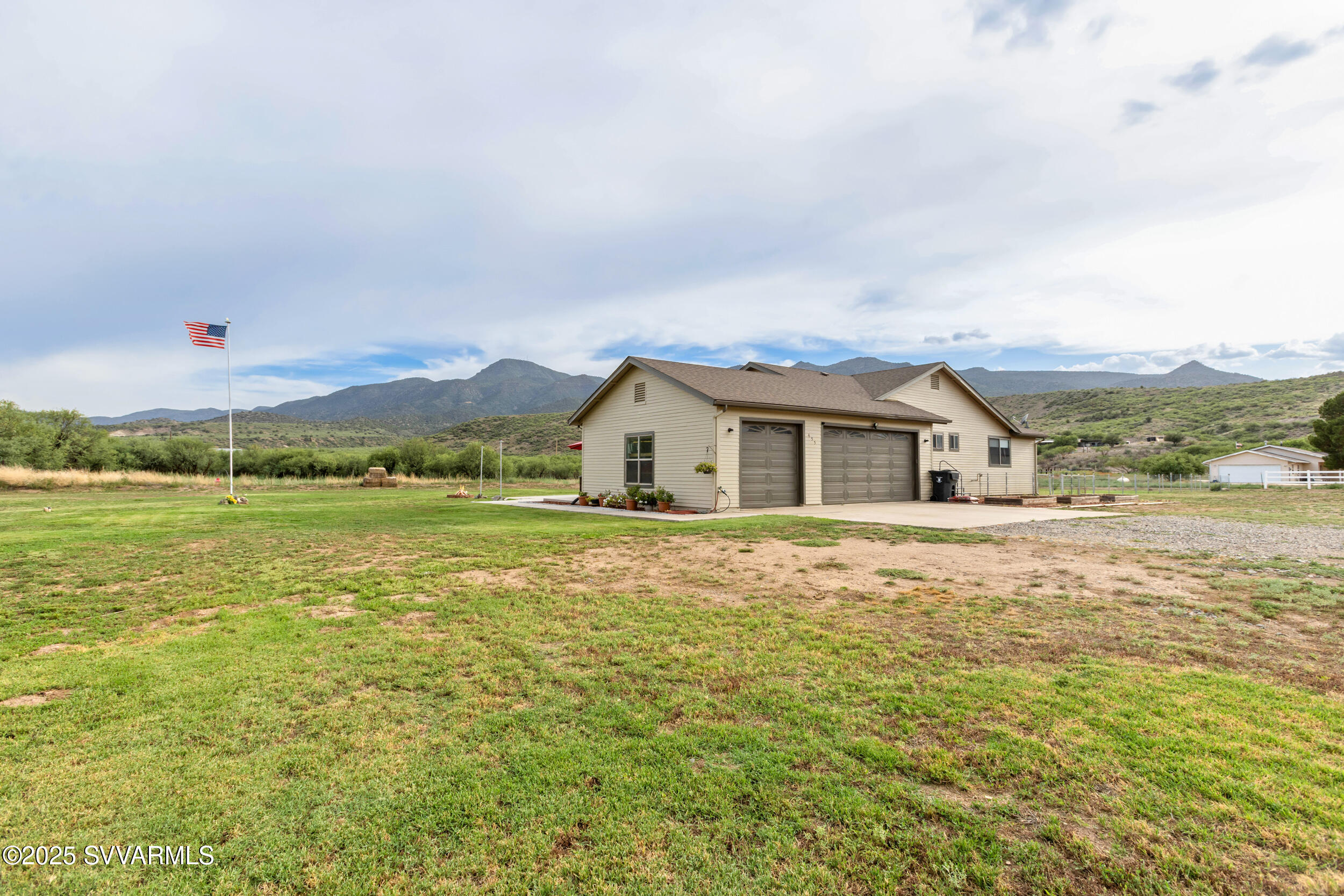 455 East Flint Knap Way Camp Verde, AZ 86322 - Photo 45 of 49 a house with swimming pool in front of it