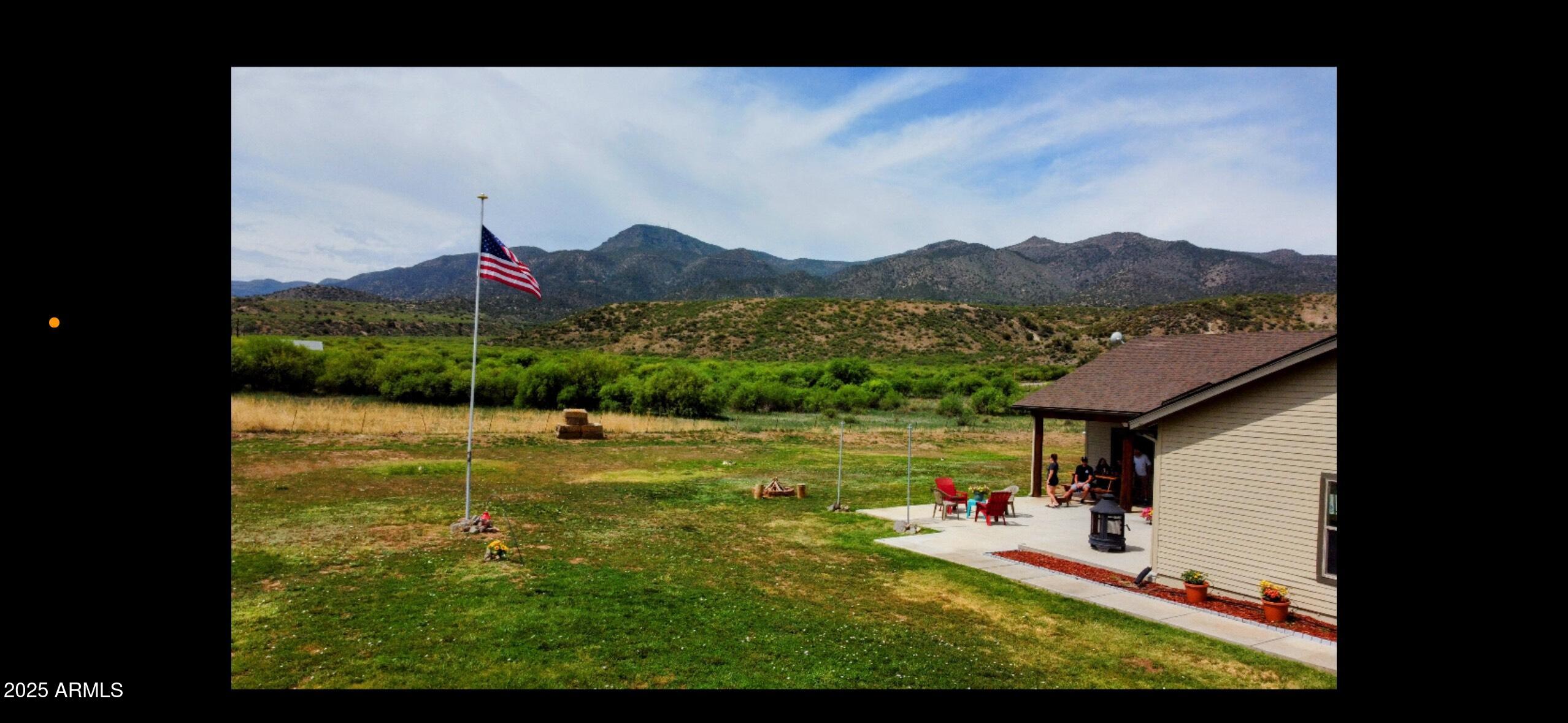 455 East Flint Knap Way Camp Verde, AZ 86322 - Photo 47 of 49 a view of a lake with a mountain in the back