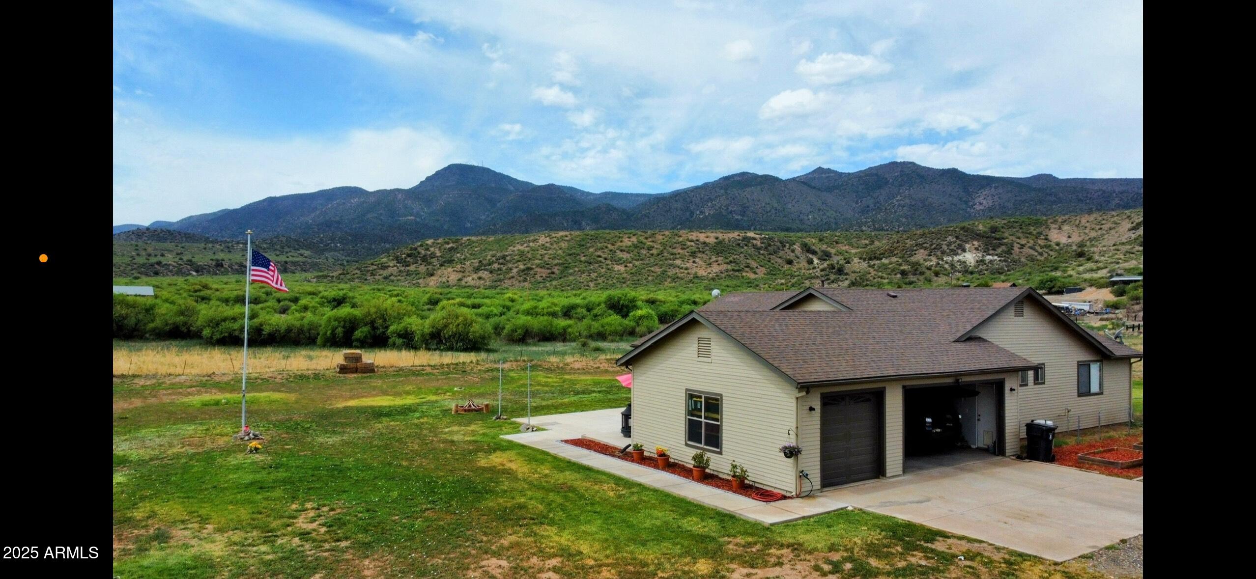 455 East Flint Knap Way Camp Verde, AZ 86322 - Photo 48 of 49 a view of a house with a garden and a wooden fence