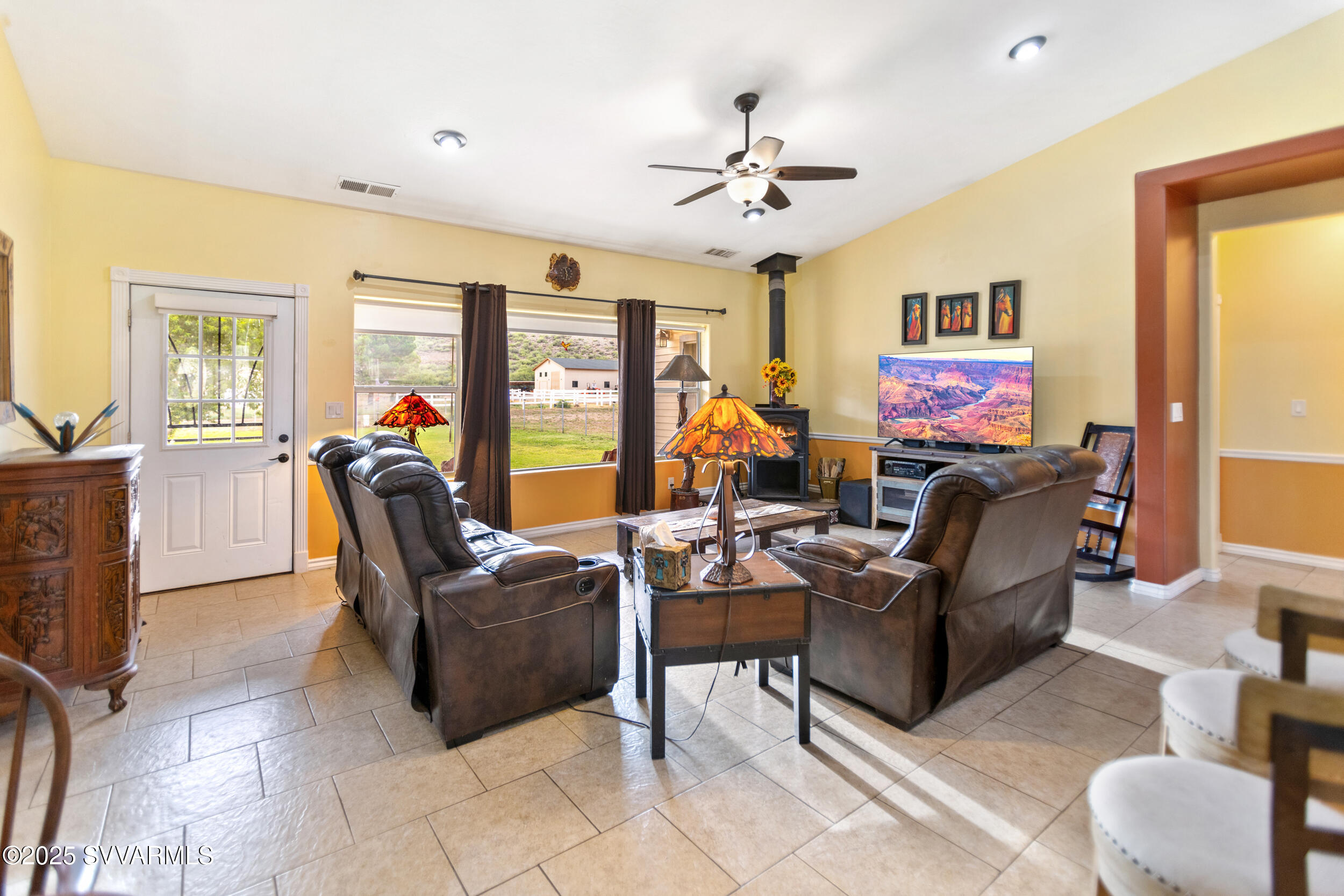 455 East Flint Knap Way Camp Verde, AZ 86322 - Photo 6 of 49 a living room with furniture and a large window