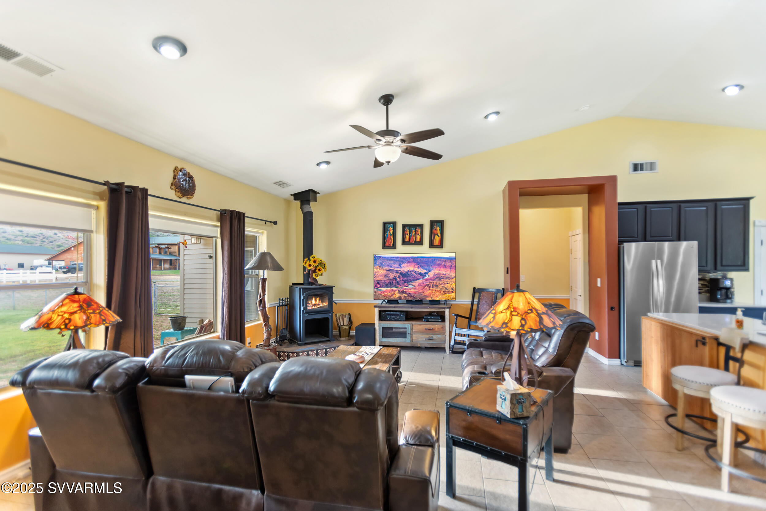 455 East Flint Knap Way Camp Verde, AZ 86322 - Photo 9 of 49 a living room with furniture and a flat screen tv