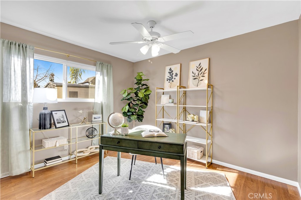 209 Madison Street Oceanside, CA 92057 - Photo 20 of 28 a living room with furniture and a potted plant