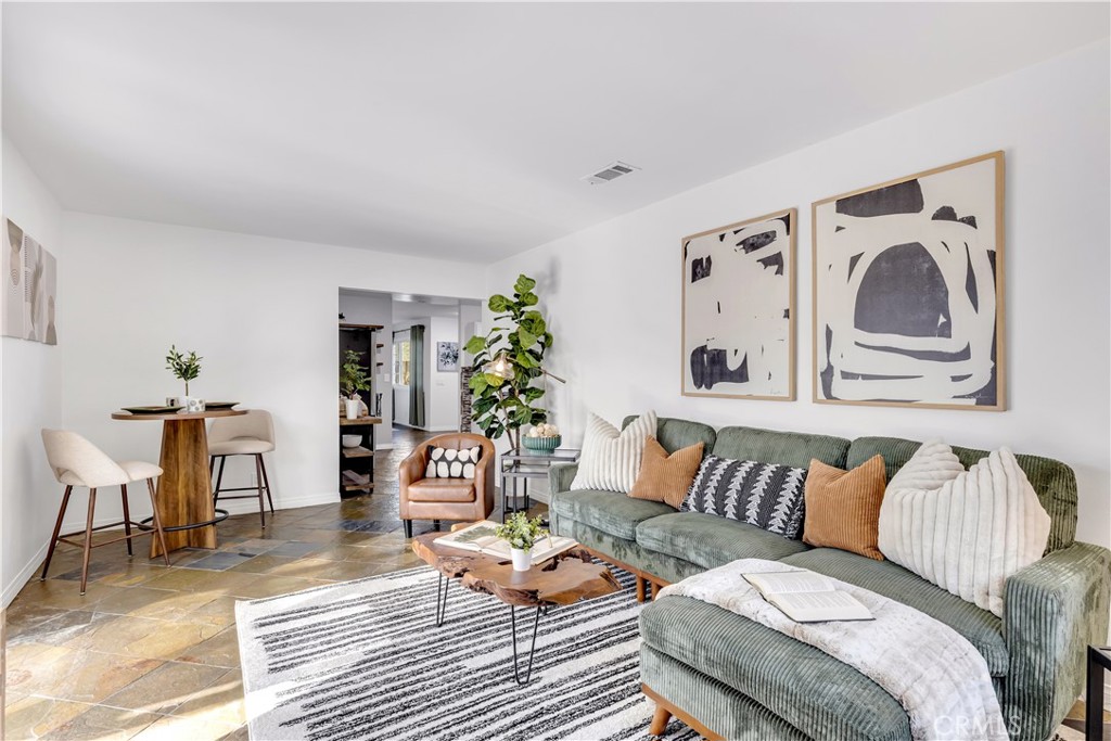 209 Madison Street Oceanside, CA 92057 - Photo 24 of 28 a living room with furniture and wooden floor