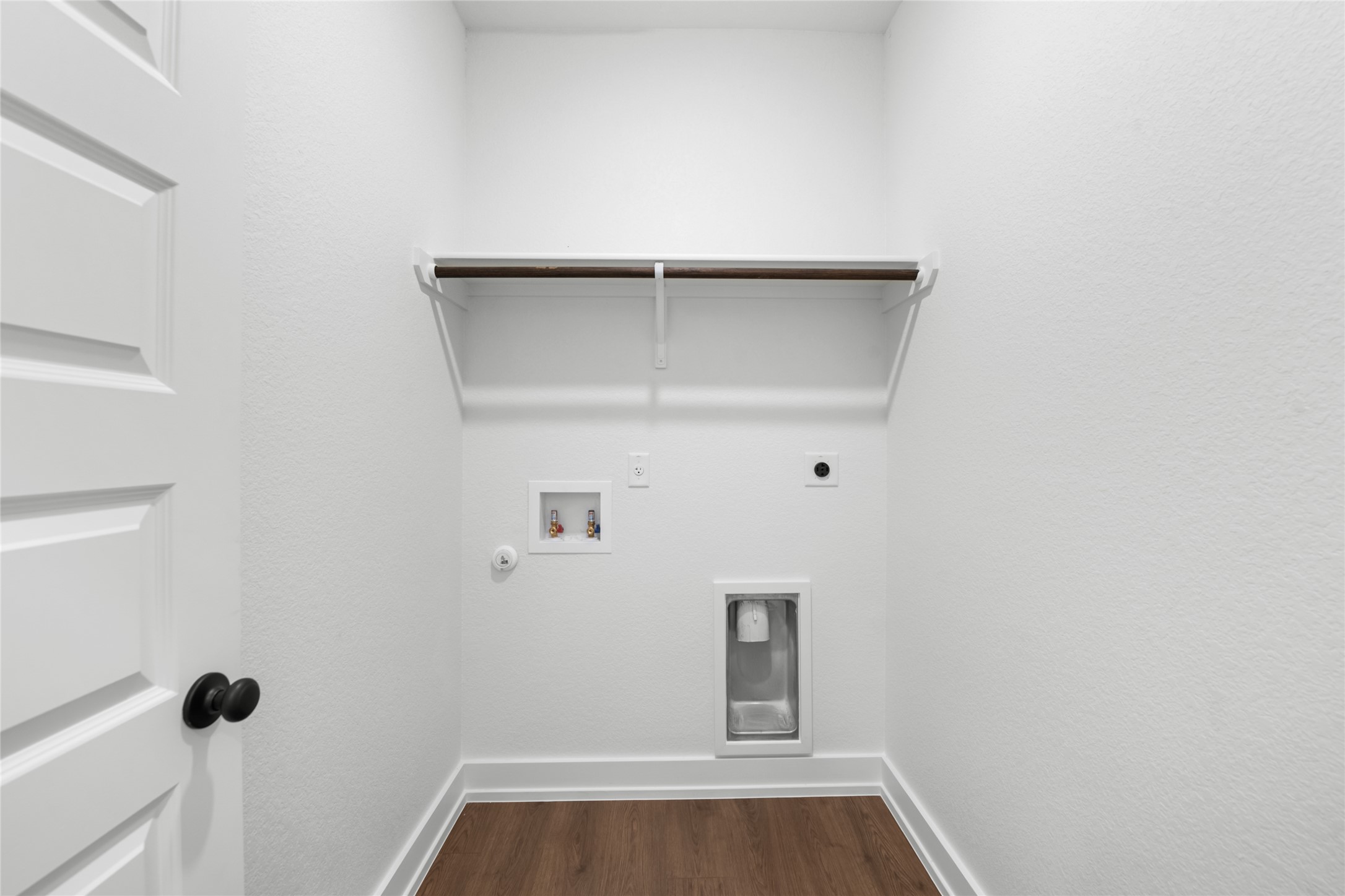 560 Gus Loop Georgetown, TX 78626 - Photo 13 of 17 a view of small space with racks on the wall