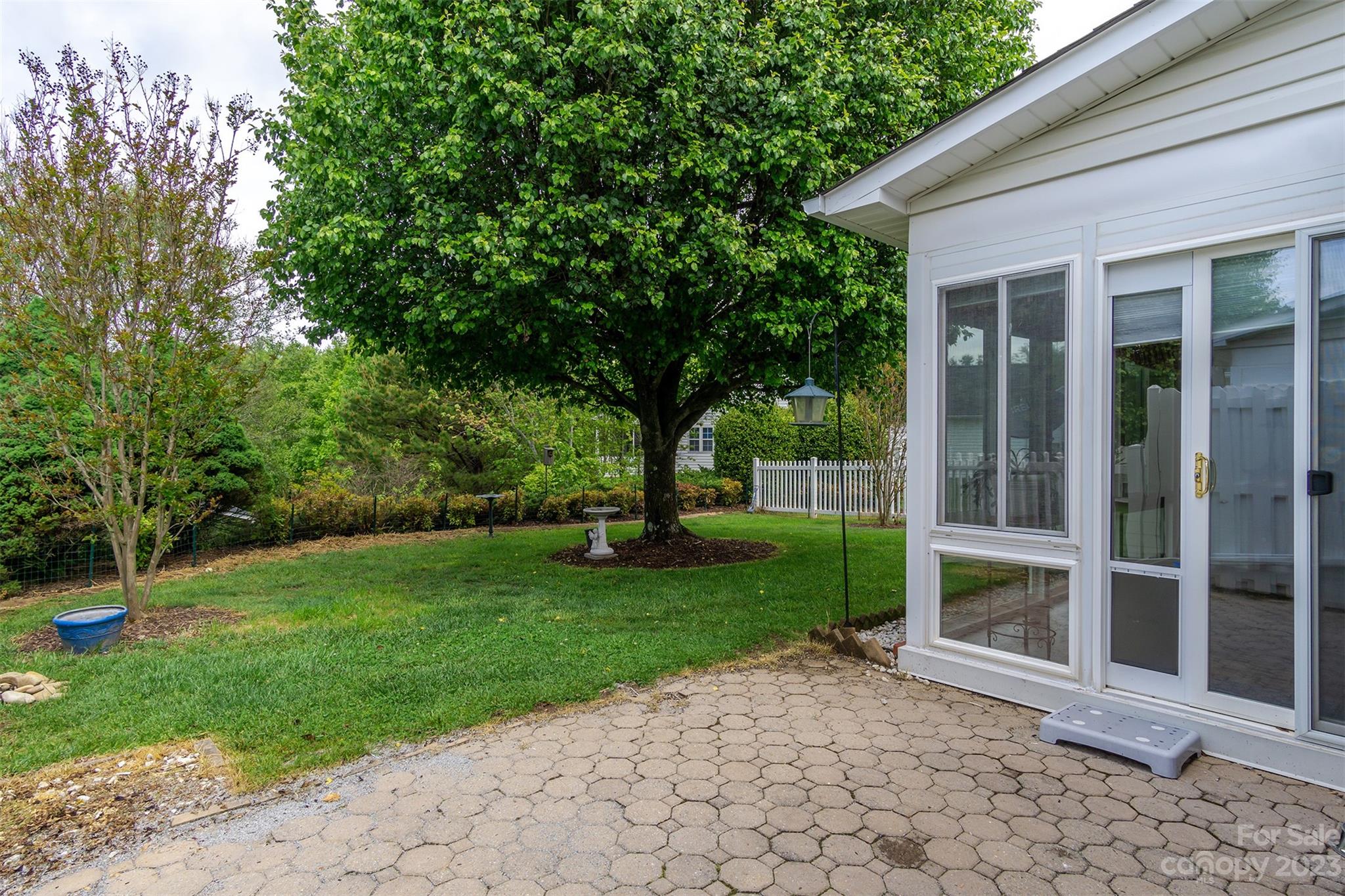 19 Briarbrook Road Fletcher, NC 28732 - Photo 39 of 46 a view of a house with backyard and a garden