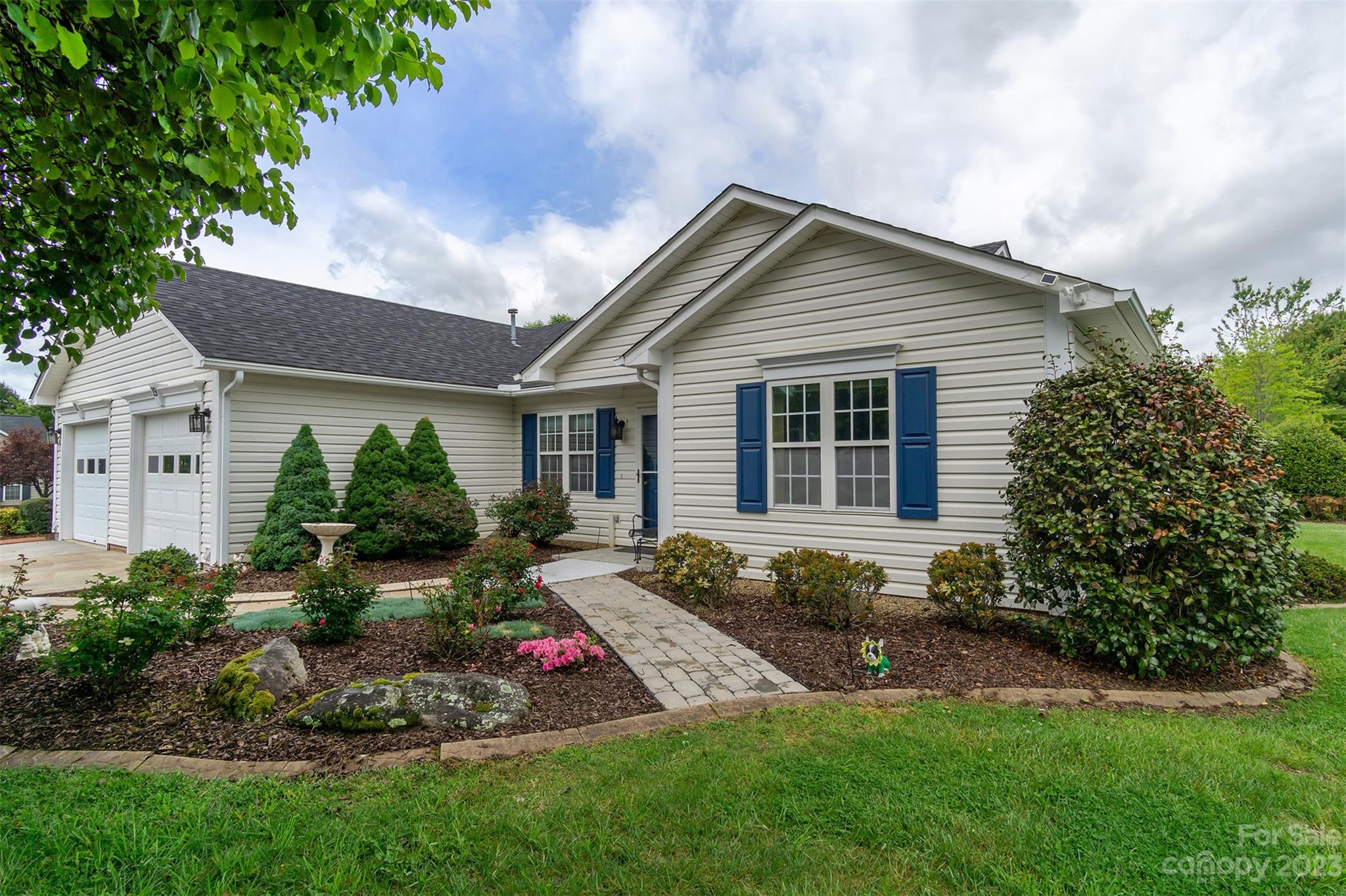 19 Briarbrook Road Fletcher, NC 28732 - Photo 6 of 46 a view of a house with a yard and plants