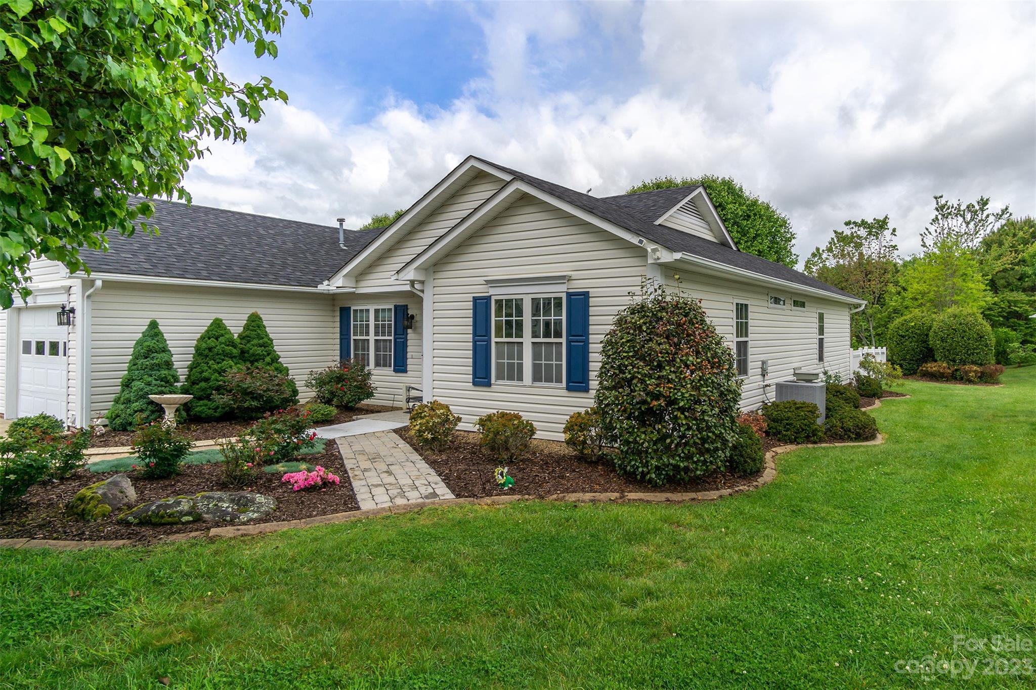 19 Briarbrook Road Fletcher, NC 28732 - Photo 7 of 46 a house view with a garden space