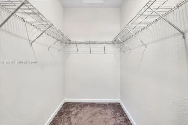 a view of a room with racks on the wall