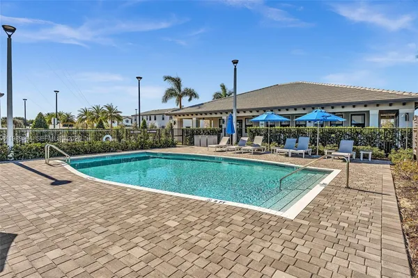 a view of a house with a swimming pool