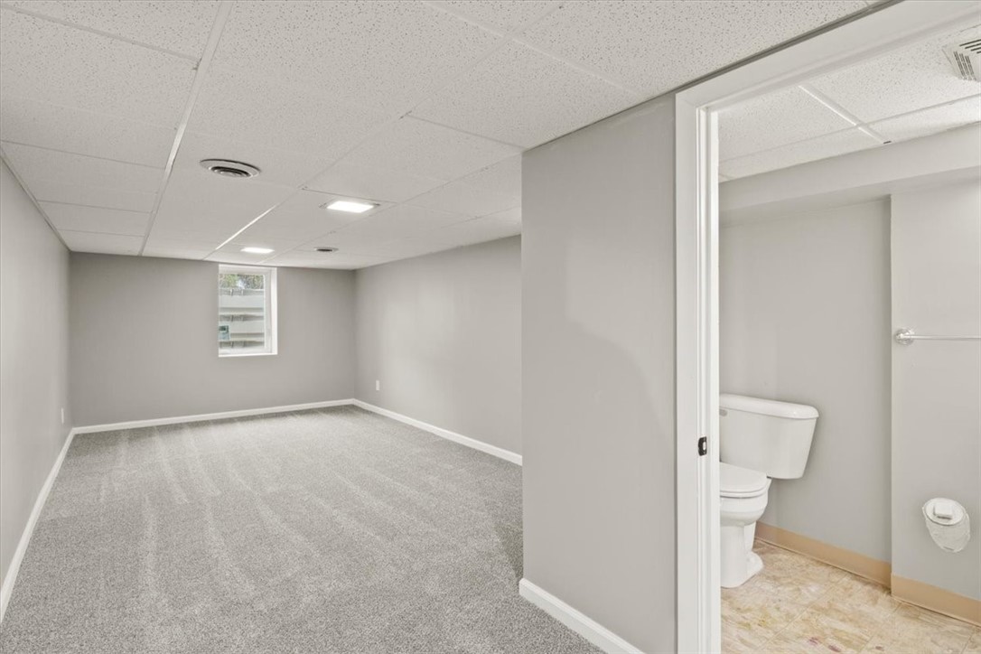 3359 Mt Read Boulevard Greece, NY 14616 - Photo 23 of 29 Basement Living Area/4th Bedroom with attached Ful