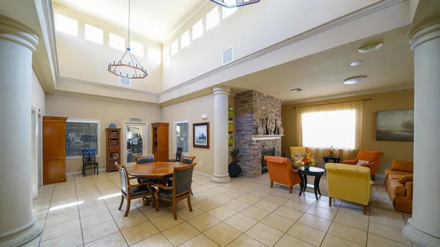 a view of a livingroom with furniture and window