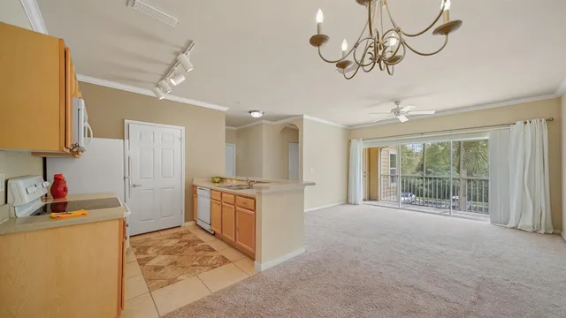 a view of a swimming pool with a lounge chair