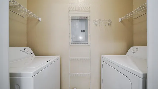 a utility room with dryer and washer