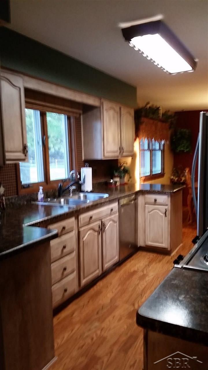 All Appliances, Range, Refrigerator, Micro,  Dishwasher, Newer counter top and back splash