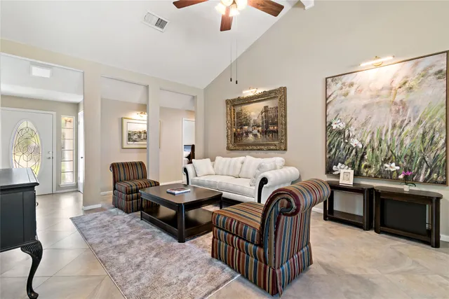a living room with furniture and a window