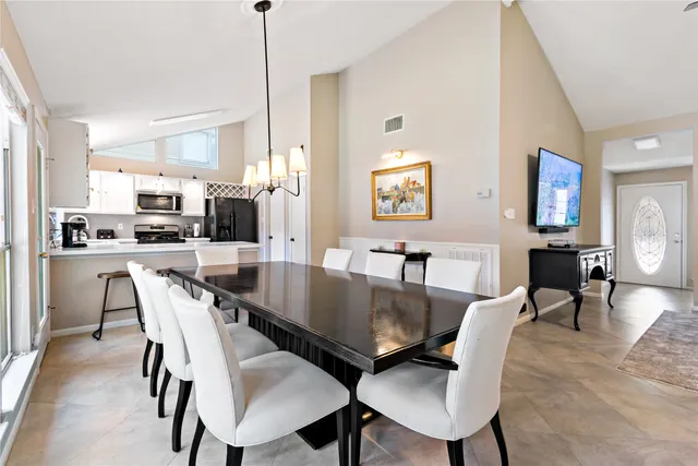 a view of a dining room with furniture