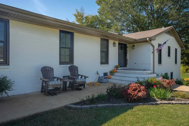 a front view of a house with patio