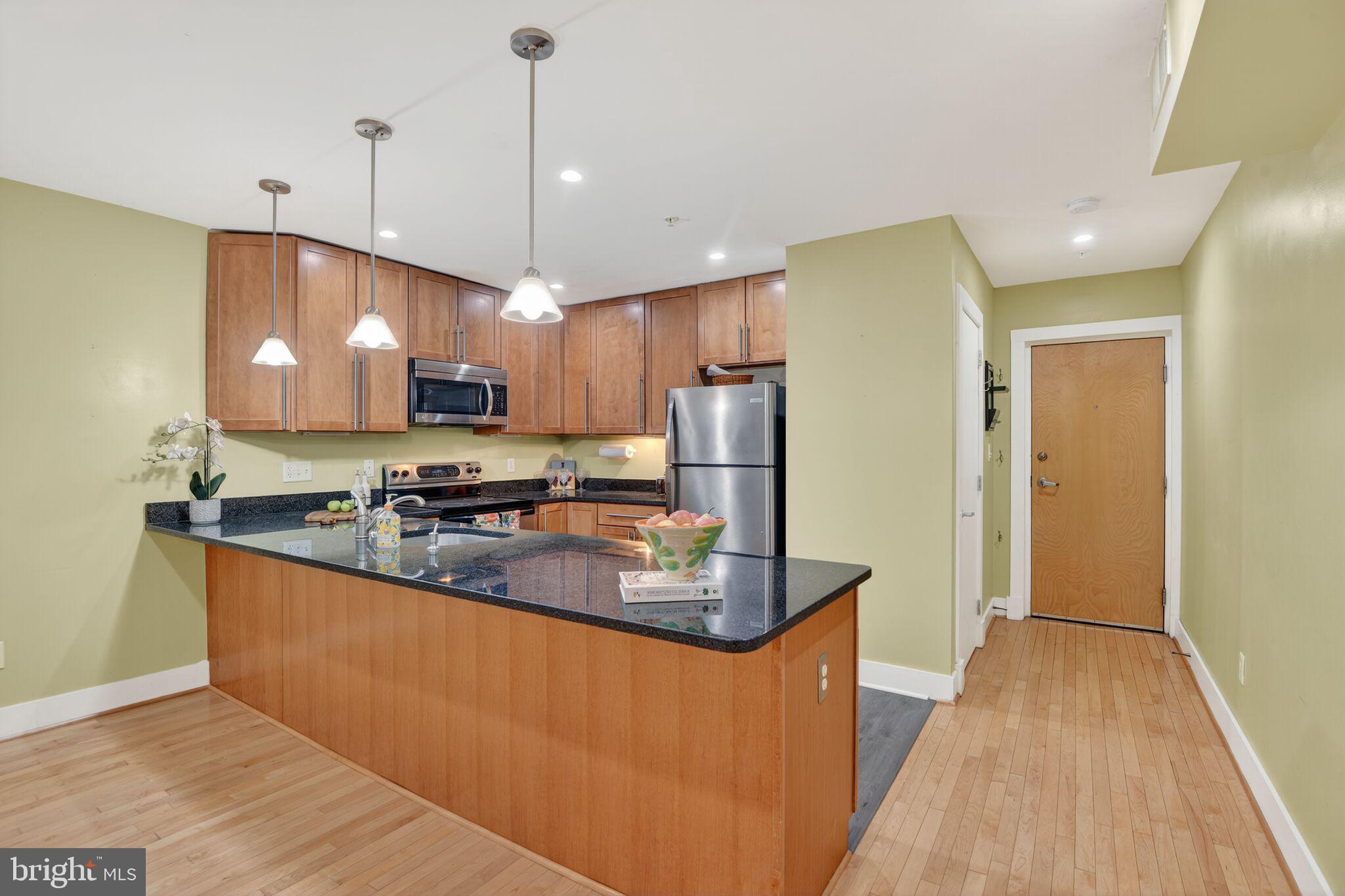 1323 K Street Southeast, Unit 203 Washington, DC 20003 - Photo 6 of 25 Counter seating for 6+