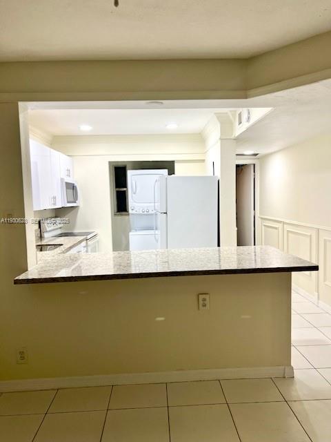 7900 South Colony Circle, Unit 105 Tamarac, FL 33321 - Photo 7 of 13 a bathroom with a sink and a mirror