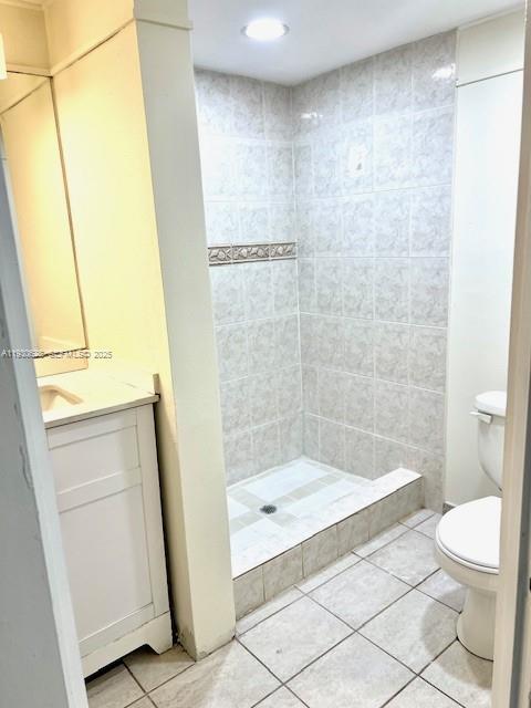 7900 South Colony Circle, Unit 105 Tamarac, FL 33321 - Photo 9 of 13 a bathroom with a bathtub and a toilet
